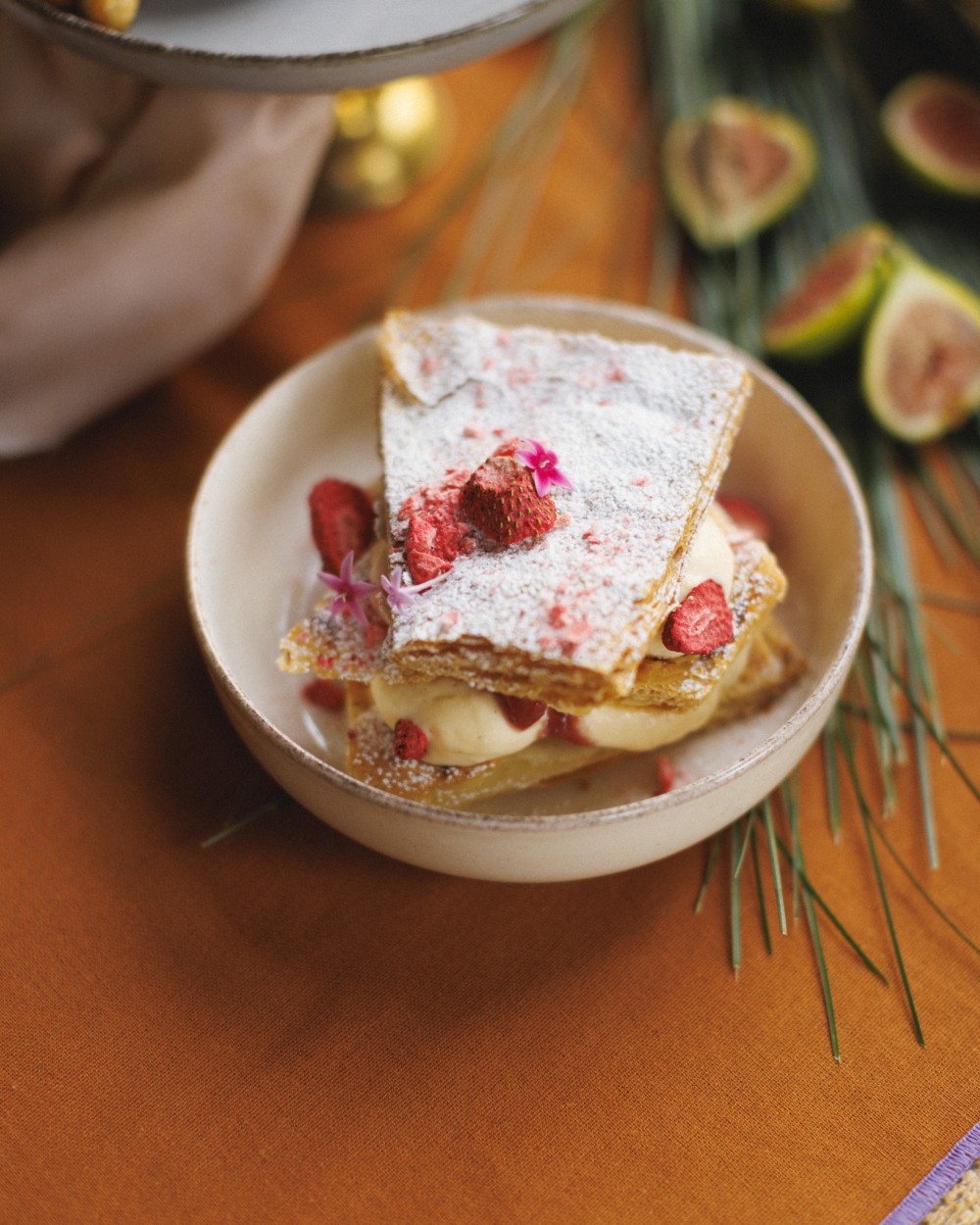 Mille-feuille with vanilla cream and raspberries